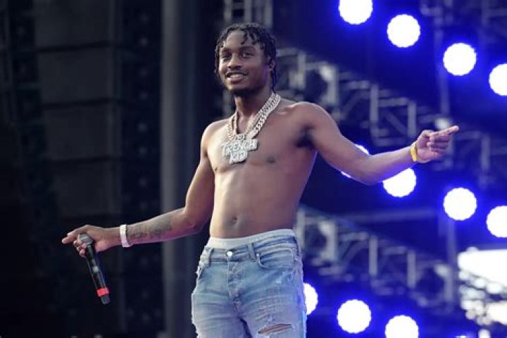 Lil Tjay Shows Off Gunshot Scars While Returning To New Jersey ·